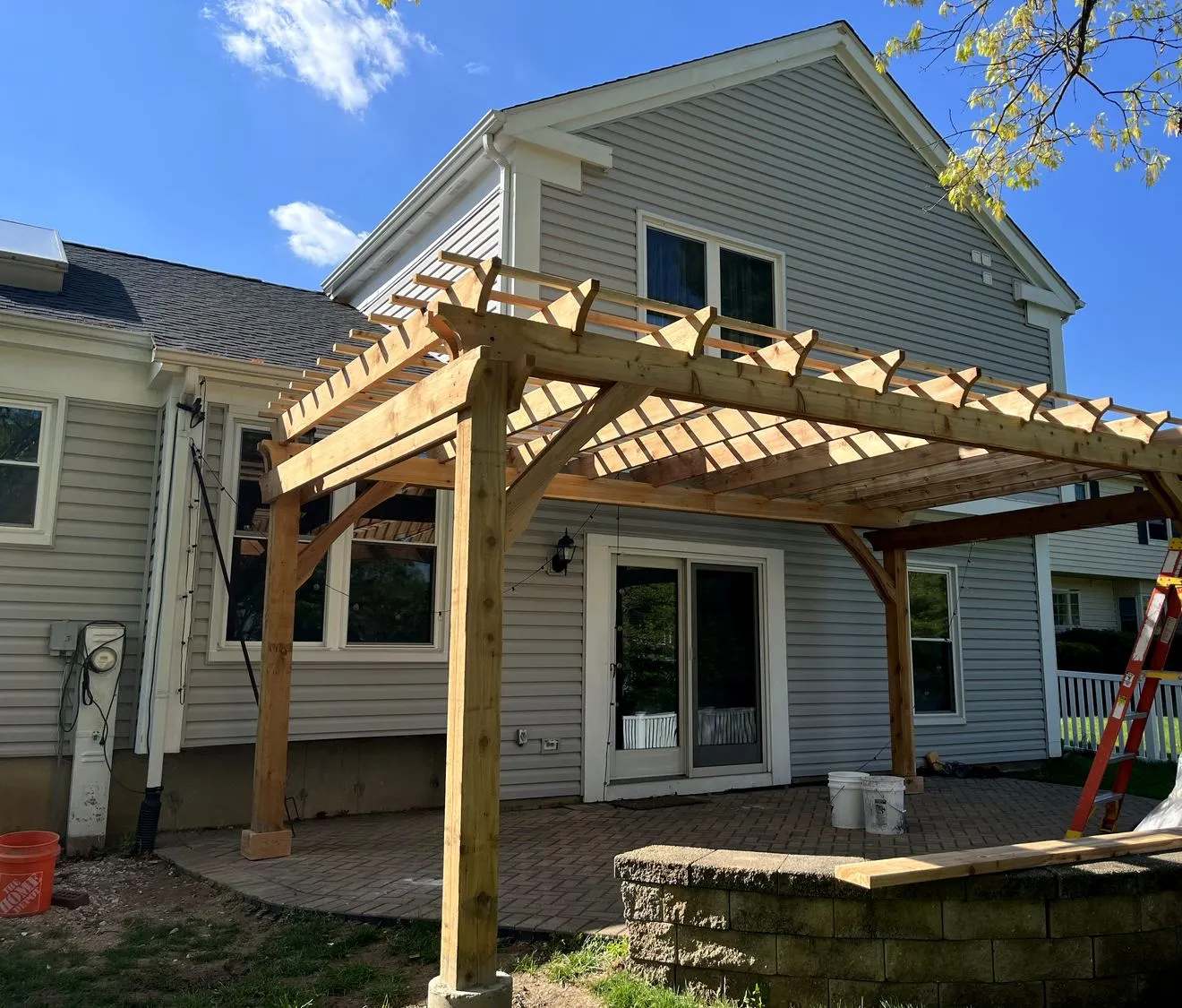Pergola tying a paver patio to the house